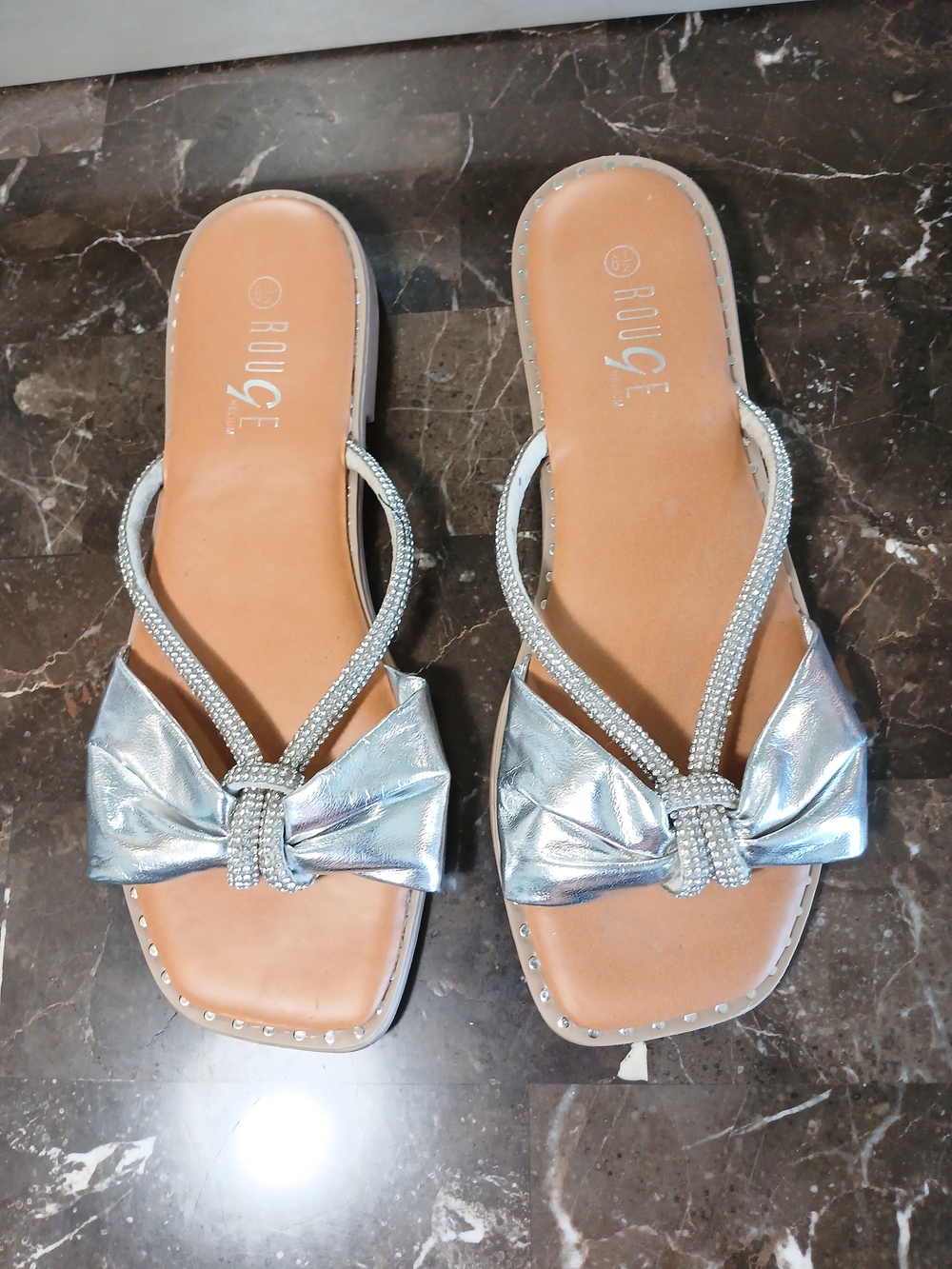 Rouge Helium Silver Bow Slide Sandals - Women's Metallic Slip-On
